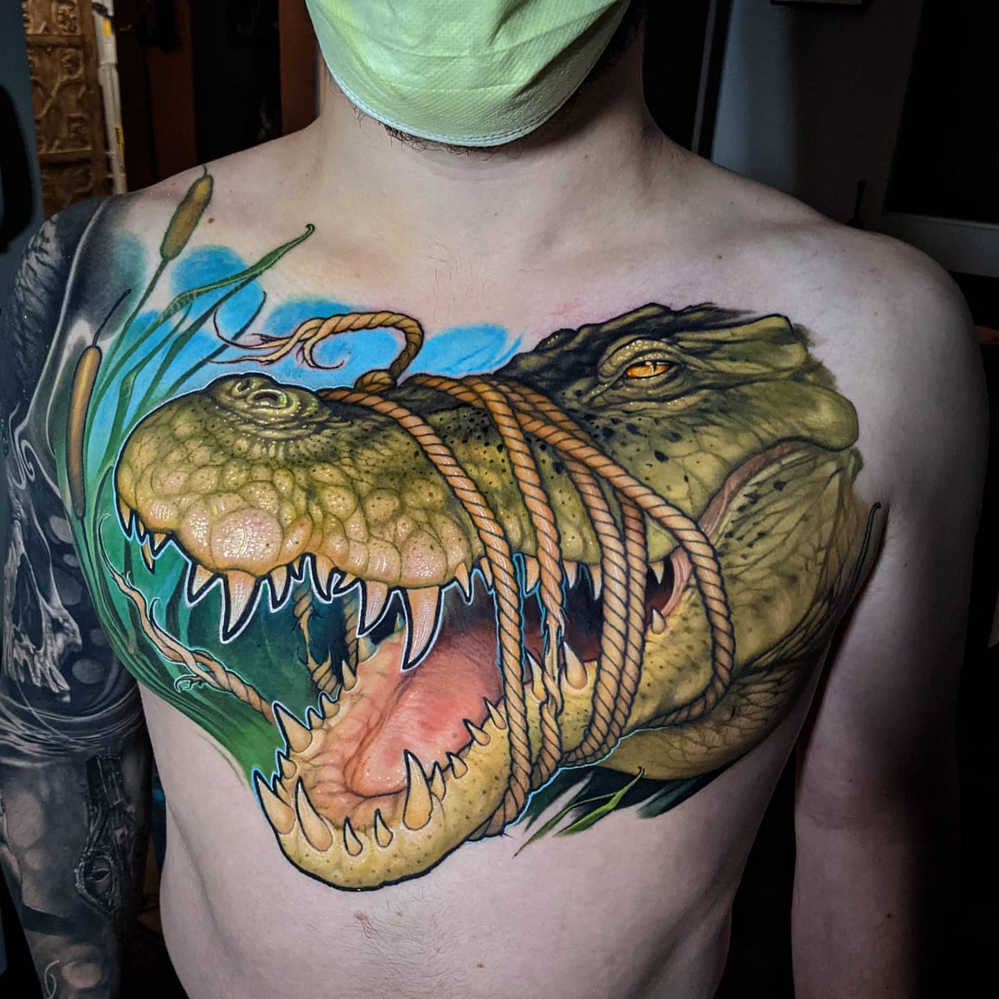 Alligator realism tattoo on the chest by Matt Driscoll