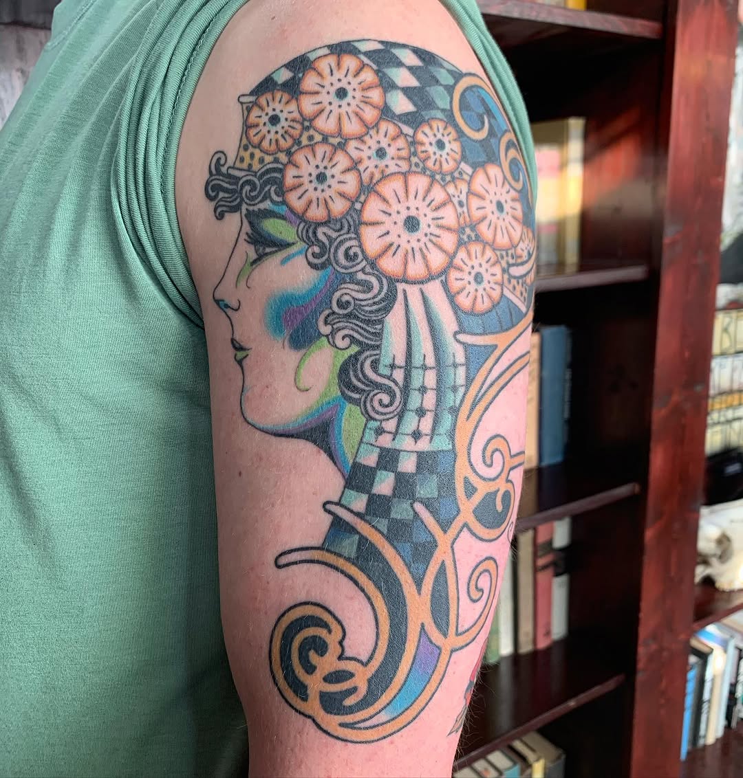 Neo-traditional tattoo on the upper arm by dayton skuse, Portland, Oregon