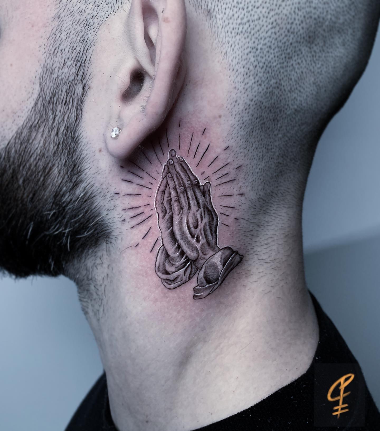 Praying hands black and grey tattoo on the neck by Christian Pelaez
