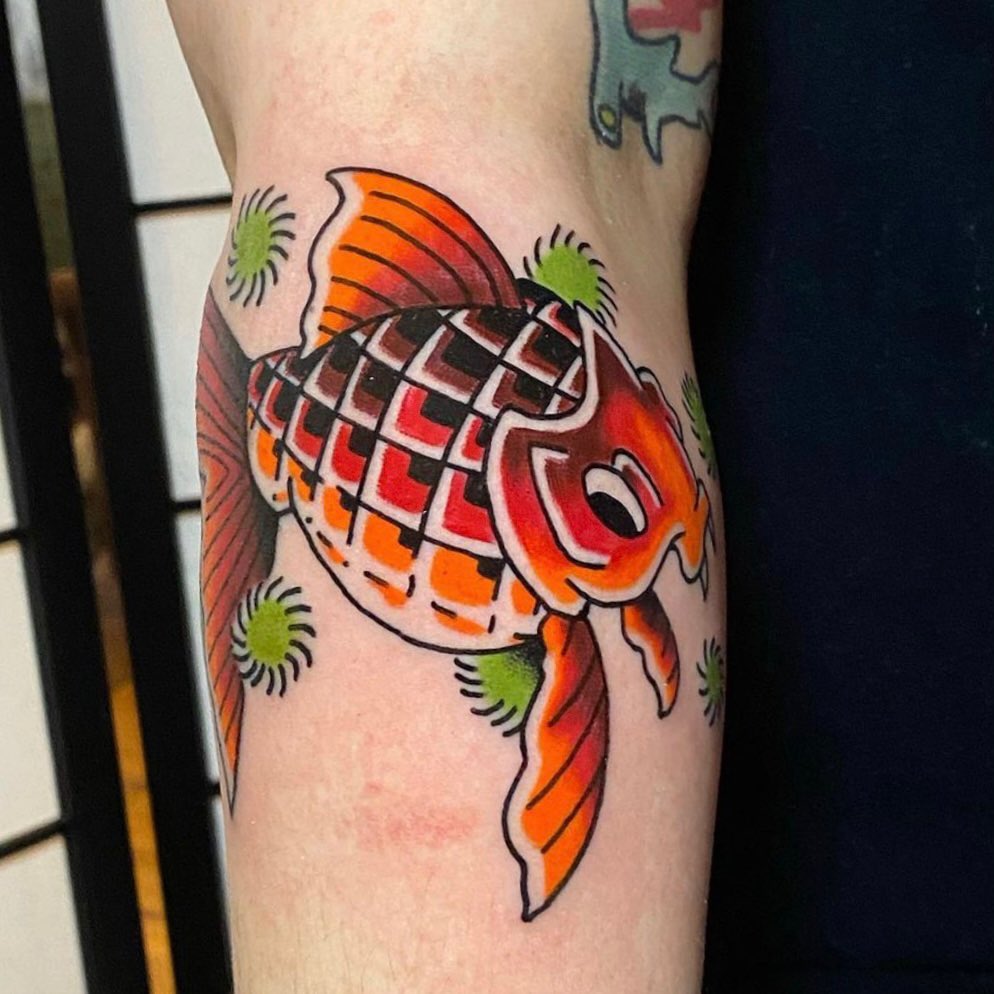 Koi fish American traditional tattoo on the forearm by David Mendieta
