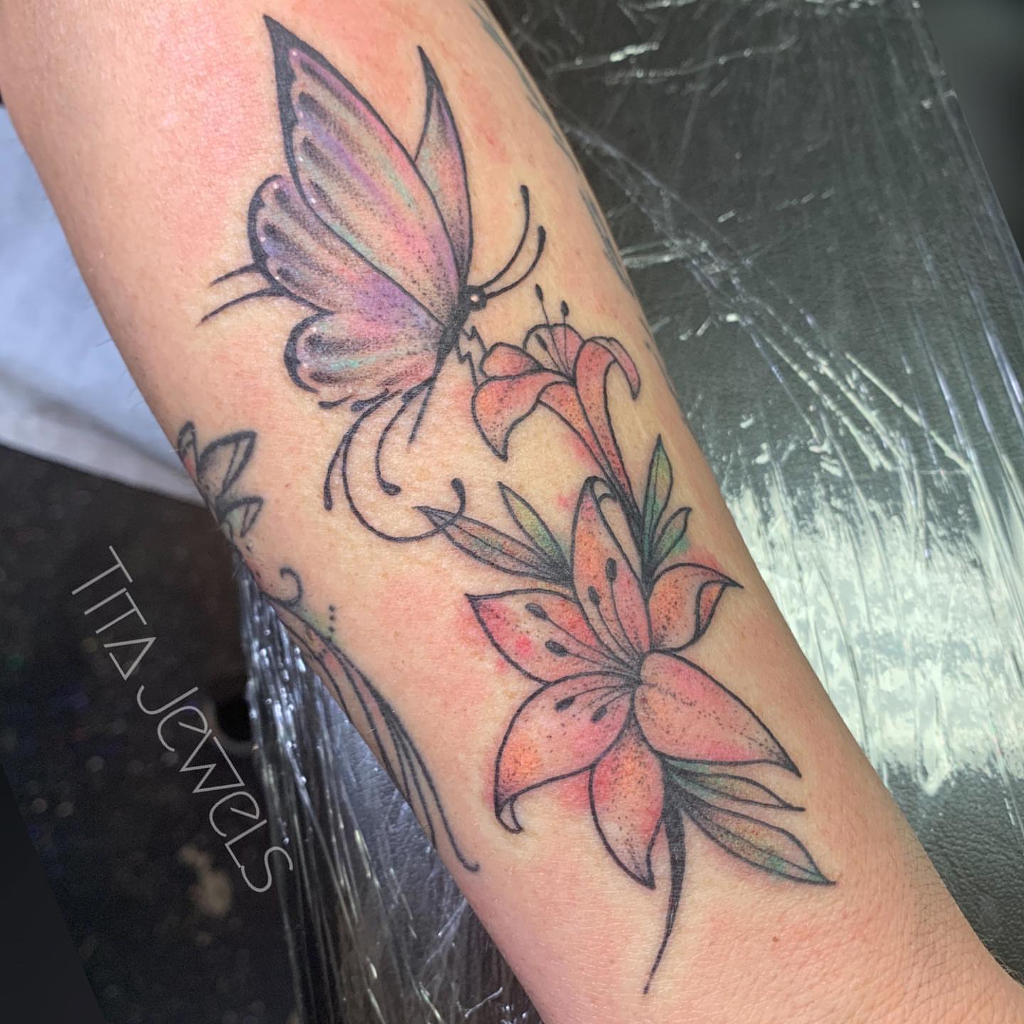 Tattoo by @titajewelstattoo — watercolor, realism