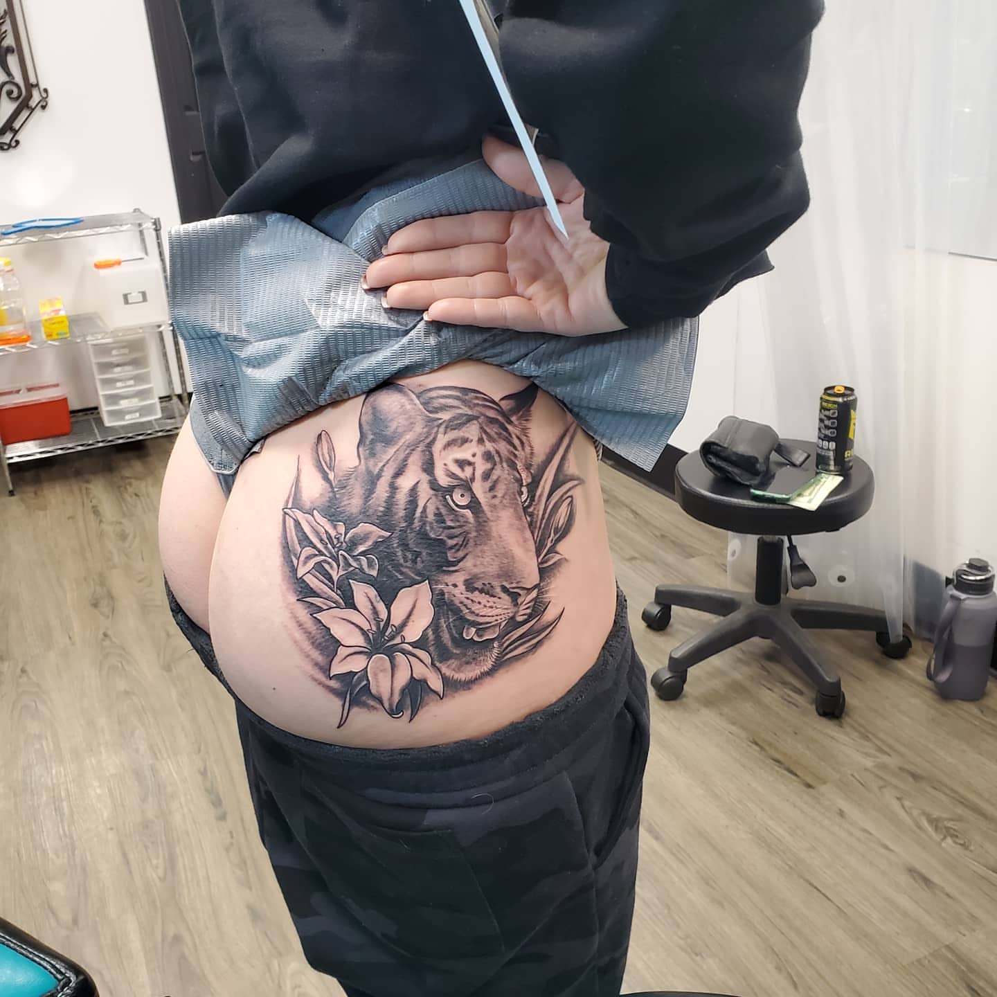 Tiger and flowers realism tattoo on the torso by @stevison15