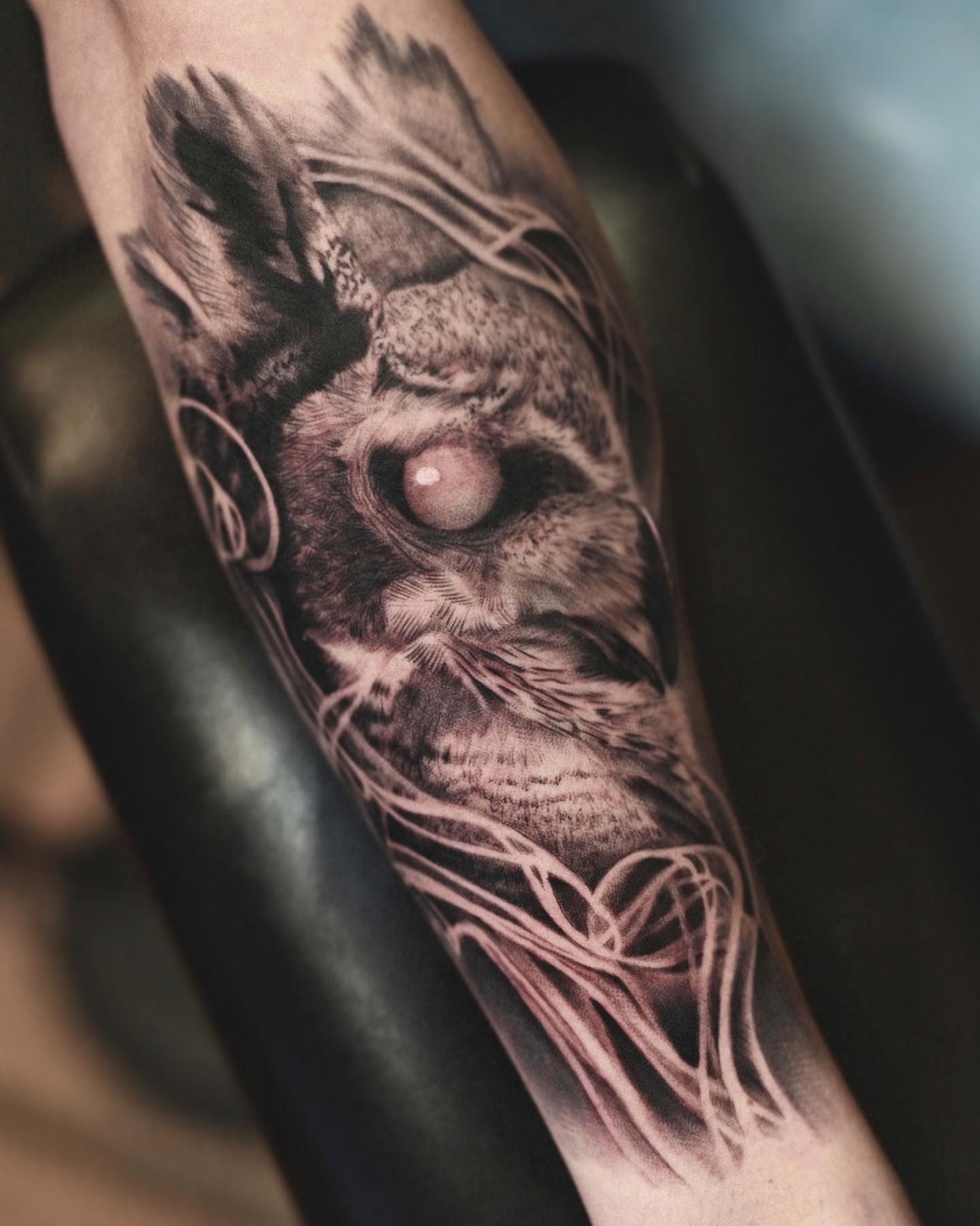 Owl realism tattoo on the forearm by Lorenzo Lopez