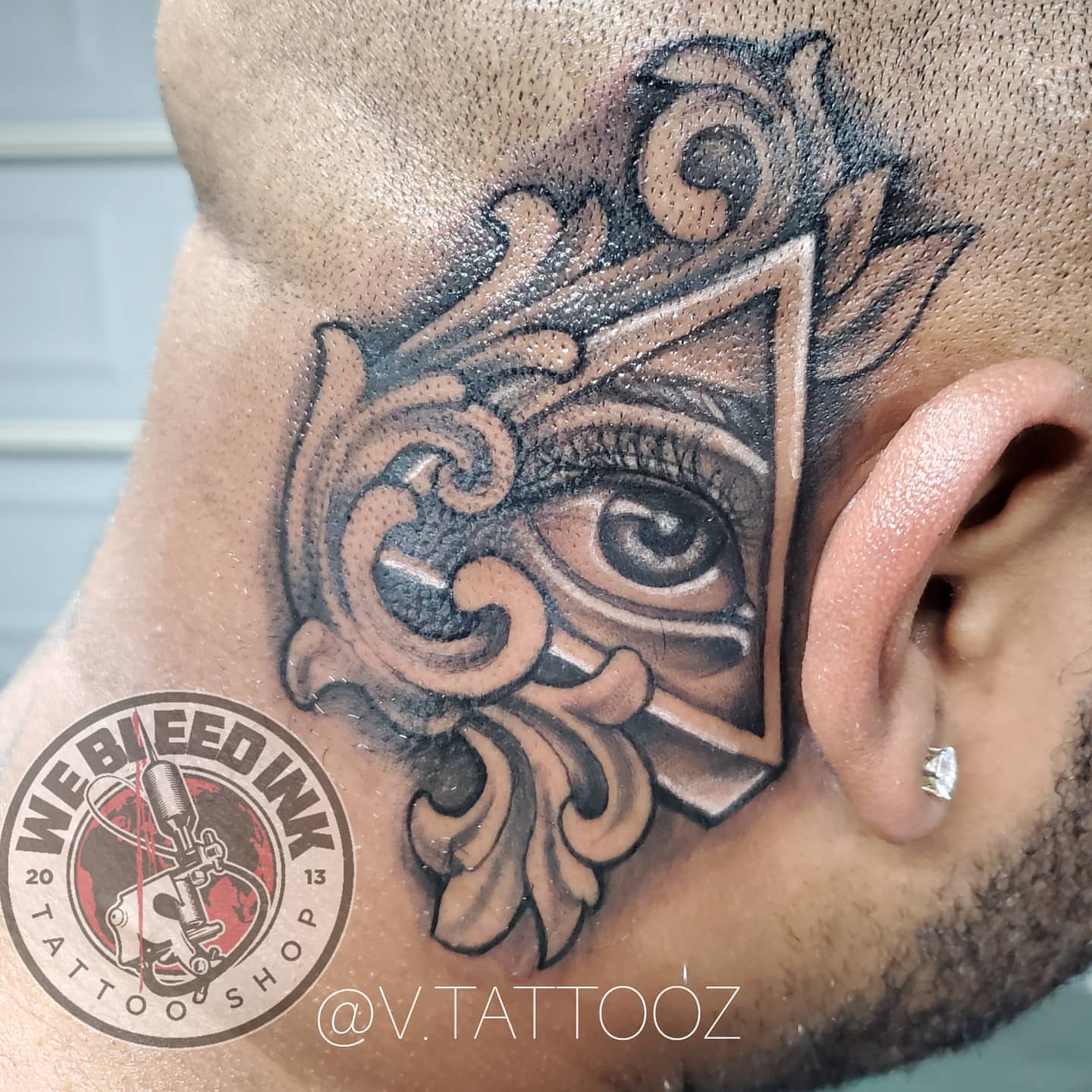 Eye and ornamental shield realism tattoo on the neck by call (504)441-9275 for info