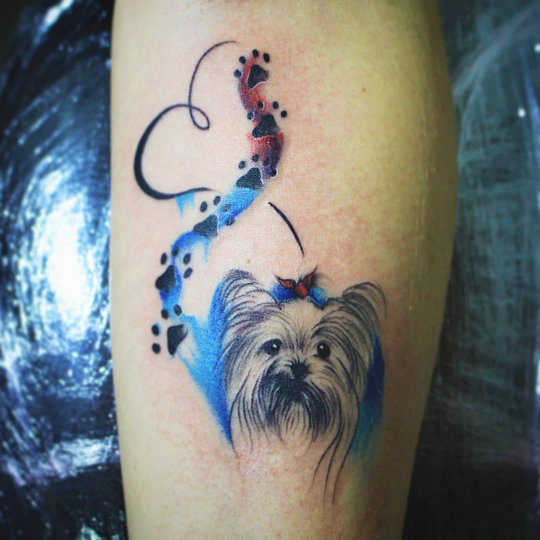 Yorkshire terrier watercolor tattoo on the forearm by Luis Chauta