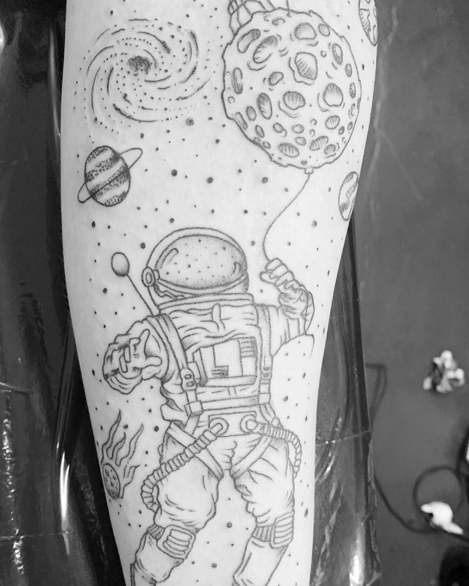 Astronaut in space dotwork tattoo on the forearm by IdleHandsFlex, New Orleans, Louisiana