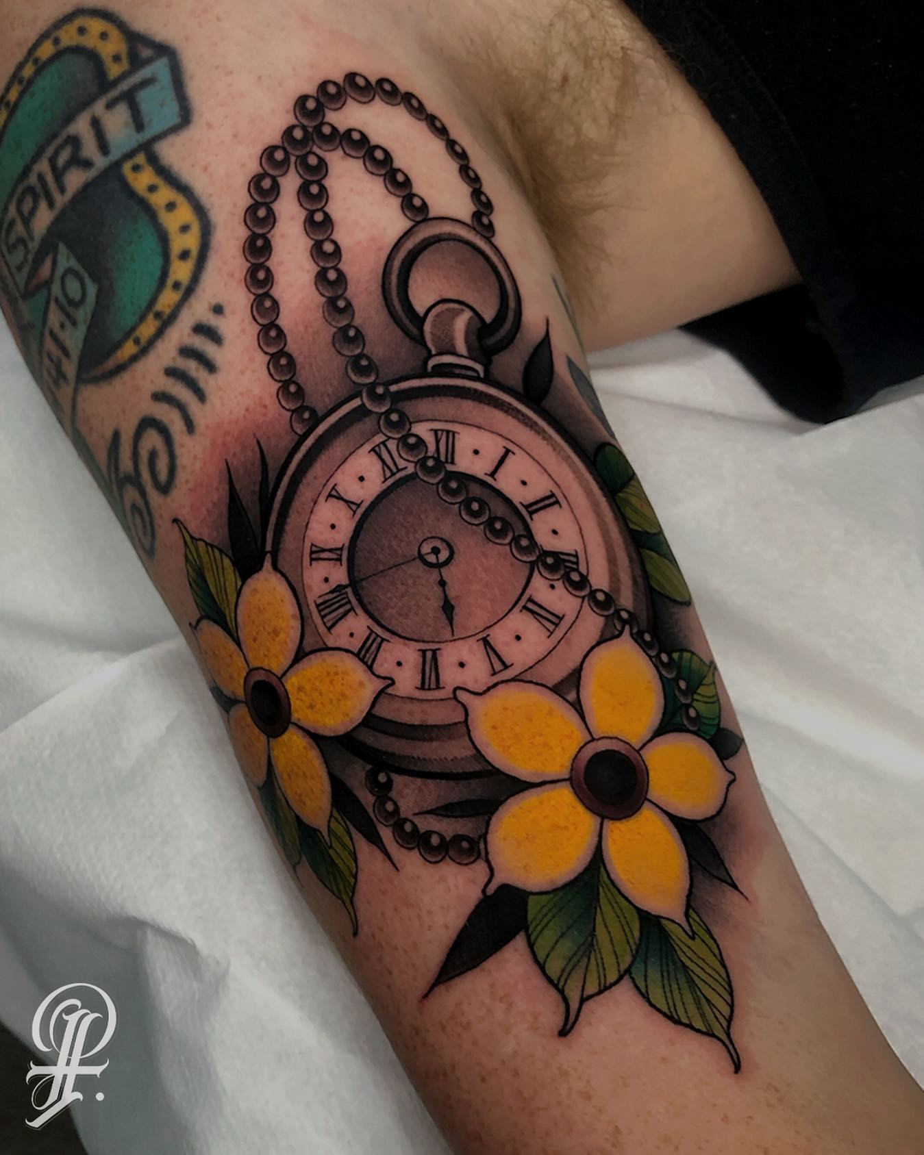 Pocket watch and flowers American traditional tattoo on the forearm by ๐ฃ๐๐๐ ๐๐ ๐ฆ๐๐๐ฉ๐