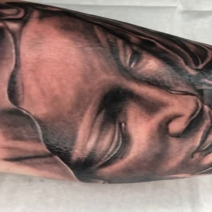 Woman and rose realism tattoo by Charlie