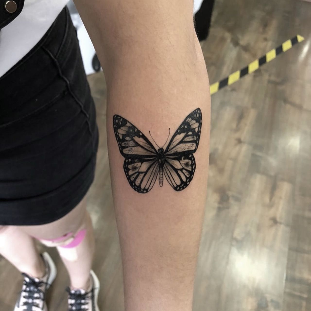 Butterfly dotwork tattoo on the forearm by Diego Aravena