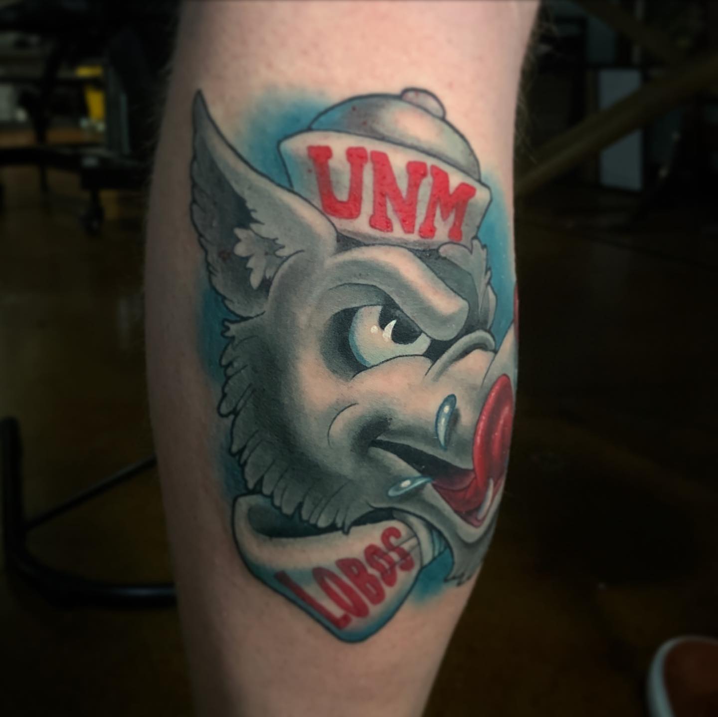 Unm lobos mascot American traditional tattoo on the forearm by Albuquerque Tattoo Artist, Albuquerque, New Mexico