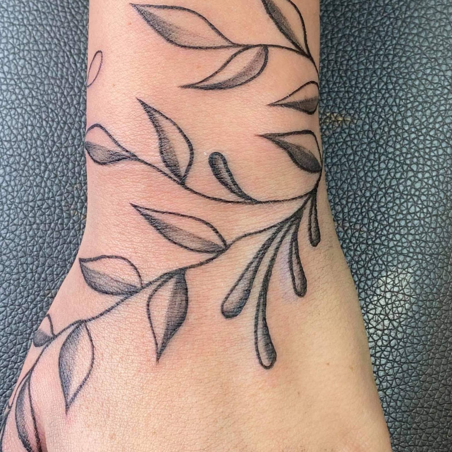 Leaf branch black and grey tattoo on the forearm by Tattoos by Hanna, Farmington Hills, Michigan