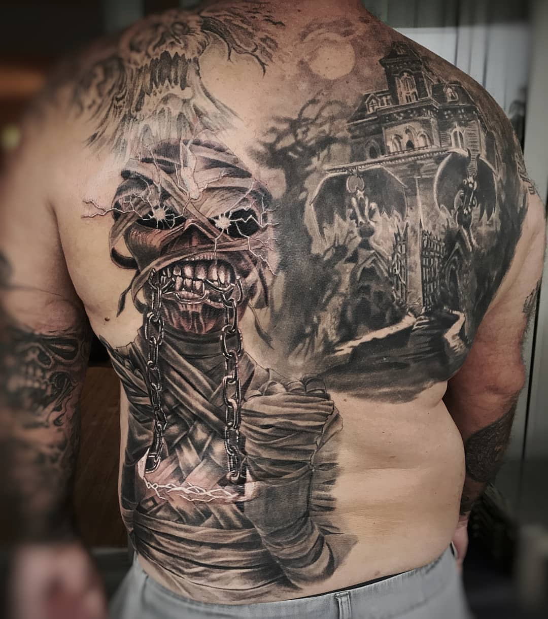 Tattoo by @ghostmantattoo — black_and_grey, realism