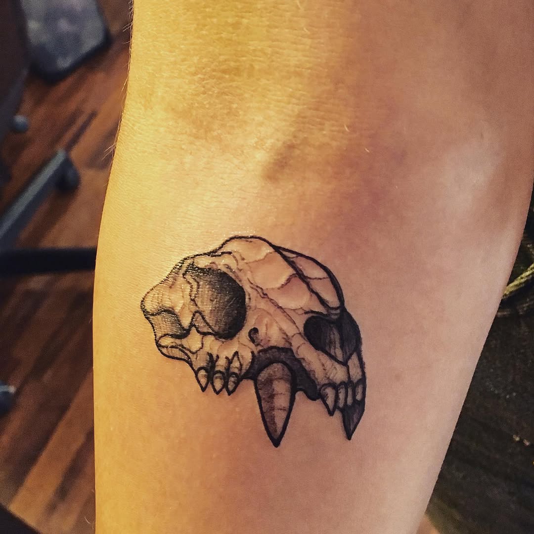 Animal skull realism tattoo on the forearm by Rhonda Faber Green