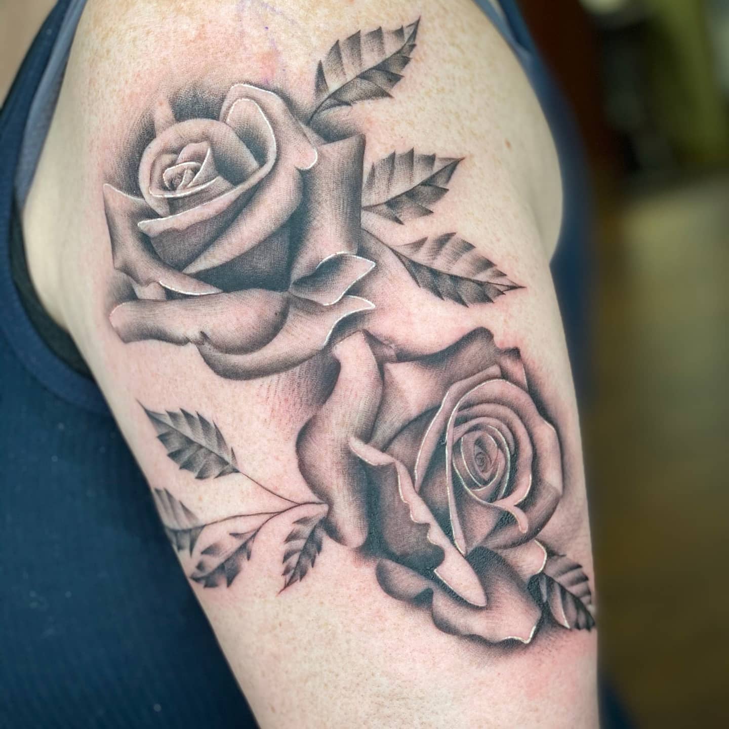 Roses black and grey tattoo on the shoulder by Tattoos by Hanna, Farmington Hills, Michigan
