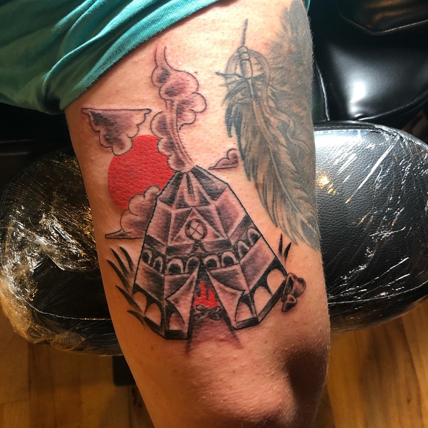 Volcano eruption American traditional tattoo on the thigh by A.W.