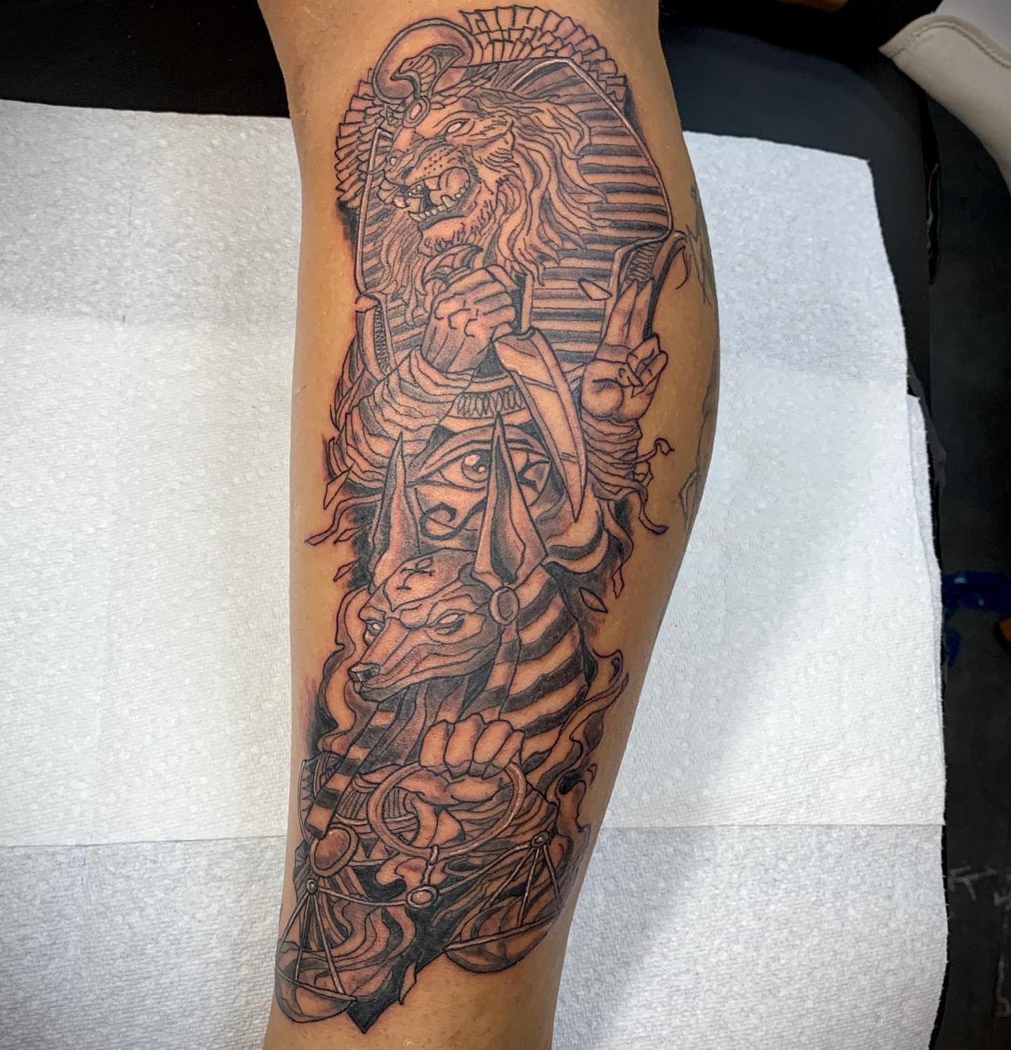 Pharaoh and lion realism tattoo on the forearm by Anthony Pichardo 🦇
