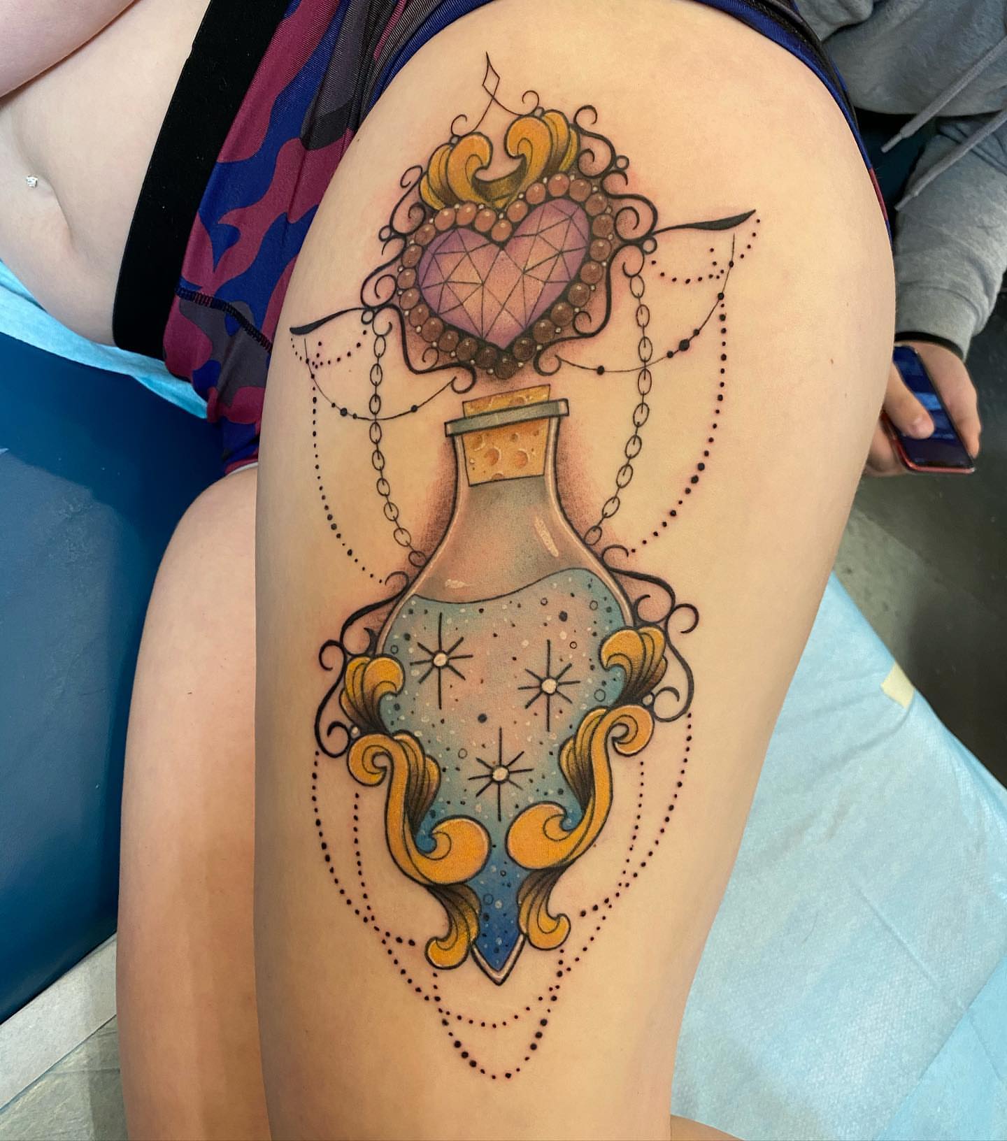 Heart in bottle geometric tattoo on the thigh by Valen Laska