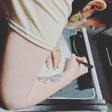 Floral design black and grey tattoo on the forearm by Nadine ☥