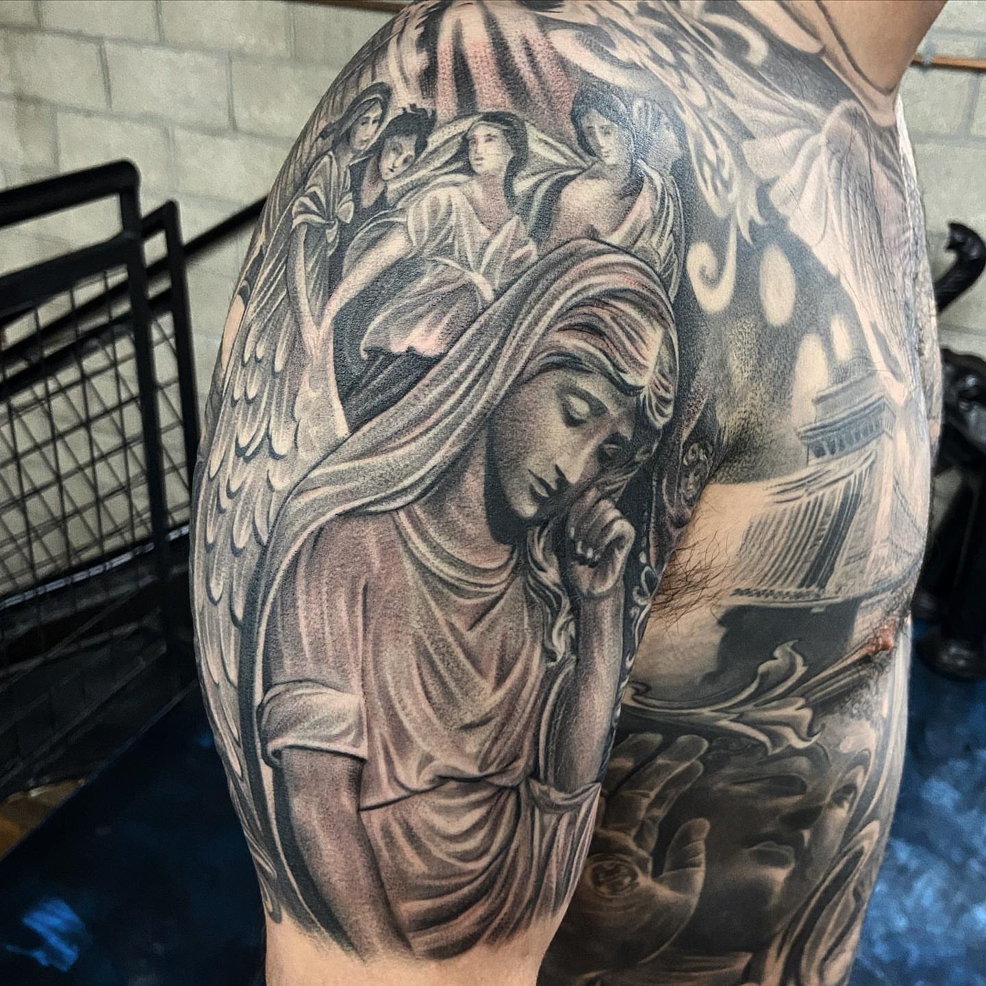 Religious scene realism tattoo on the shoulder by Creeper tattoo