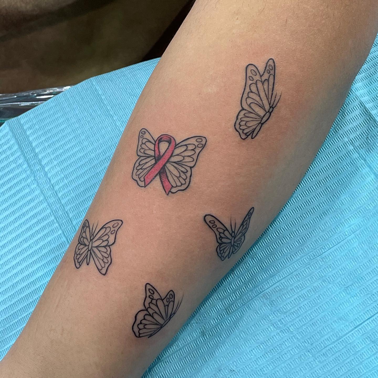 Butterfly dotwork tattoo on the forearm by Yari, Los Angeles, California