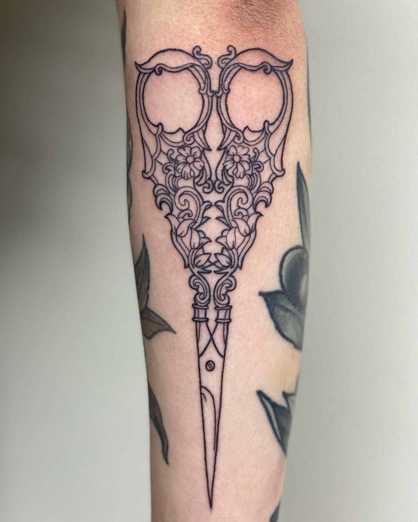 Scissors ornamental tattoo on the forearm by 𝕤𝕒𝕣𝕒𝕙 𝕞𝕠𝕣𝕒𝕟📌, Dayton, Ohio