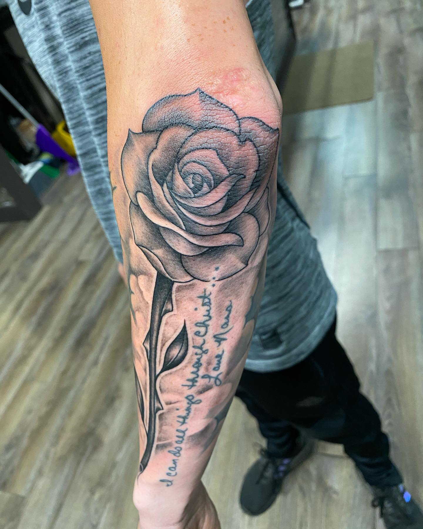 Rose realism tattoo on the forearm by Dustin Lane Collins