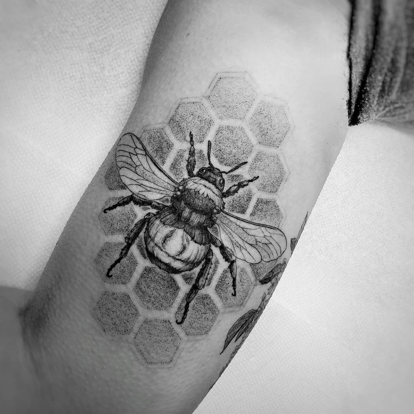 Bee dotwork tattoo on the forearm by Matthew Barnett