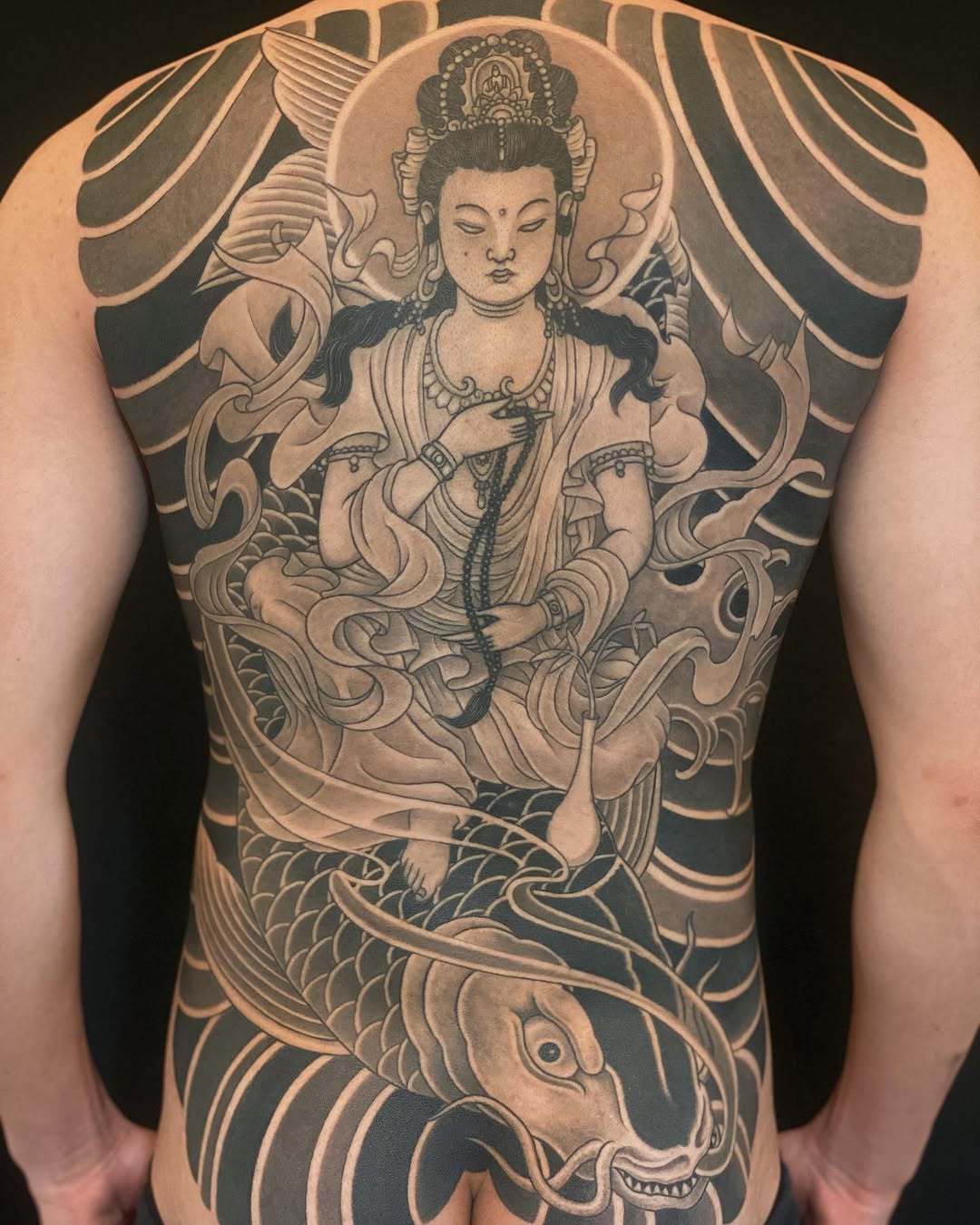 Buddha and koi fish Japanese tattoo on the back by 重君
