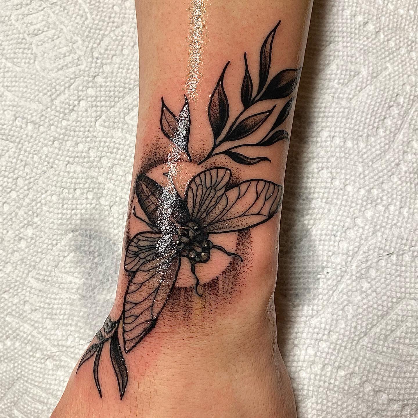 Dragonfly dotwork tattoo on the forearm by Cj Hurtado