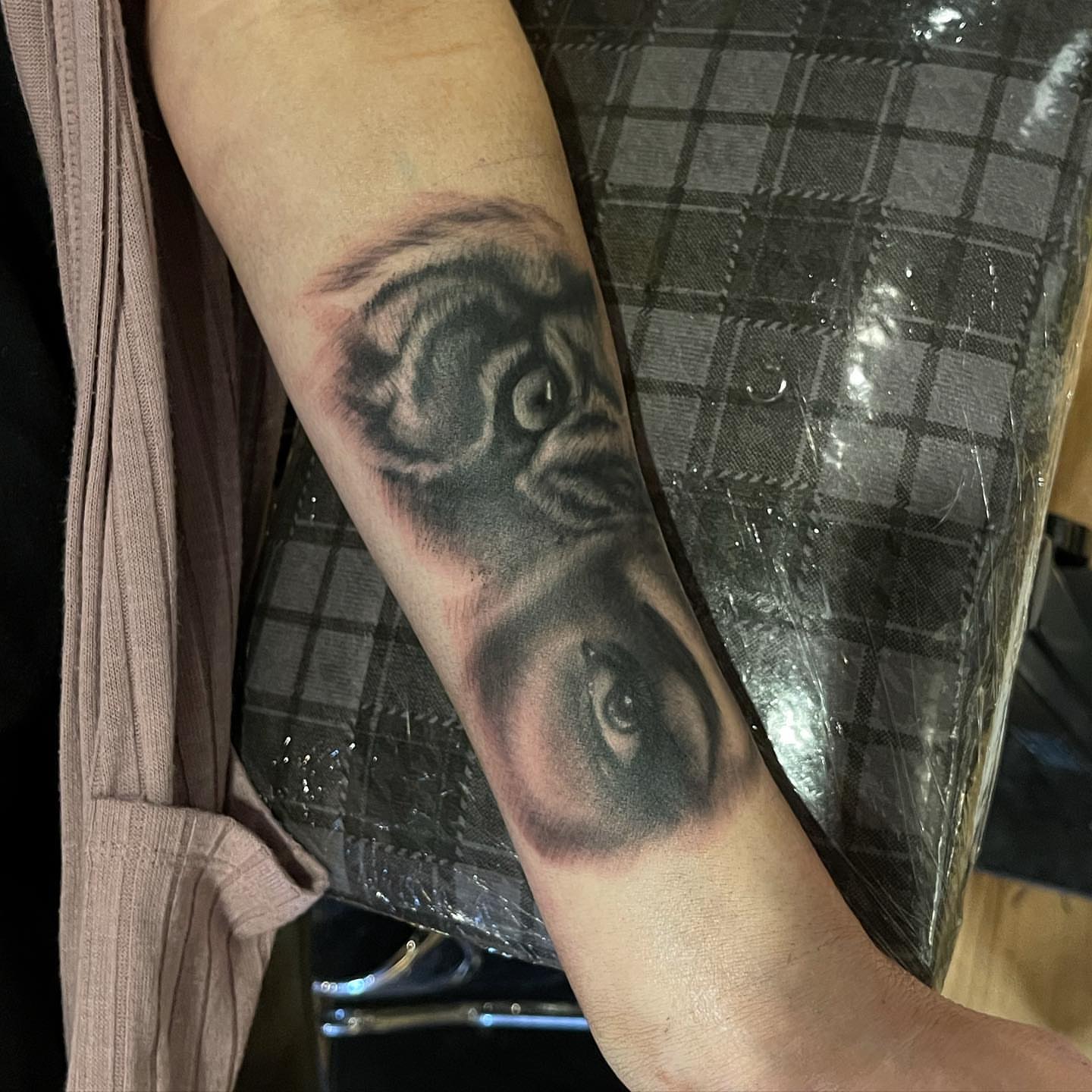 Eyes realism tattoo on the forearm by Jeff Kees