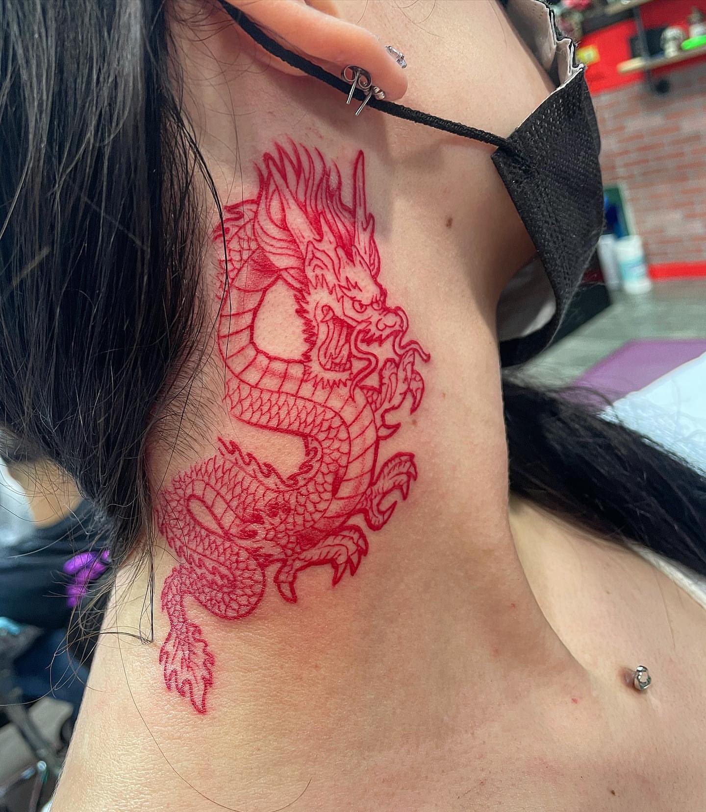 Dragon American traditional tattoo on the neck by Yari, Los Angeles, California