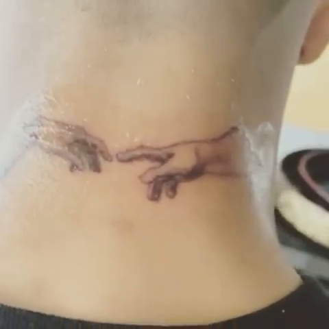The Creation of Adam hands realism tattoo by Daniel Monyongo