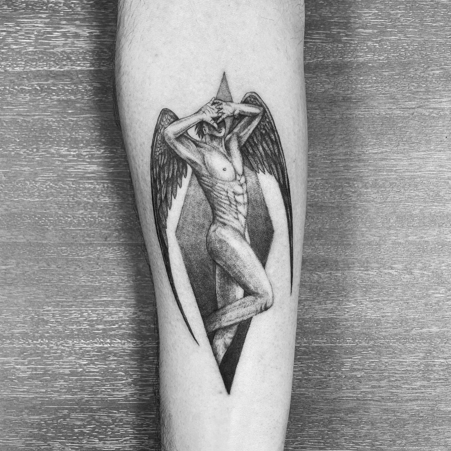 Angelic figure geometric tattoo on the forearm by eugene k 🌈, San Francisco, California