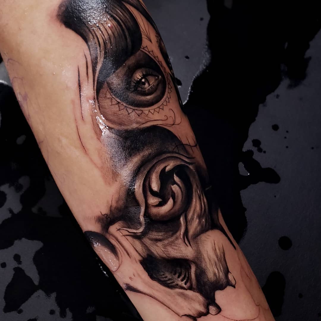 Eye and swirl realism tattoo on the forearm by @doctorze