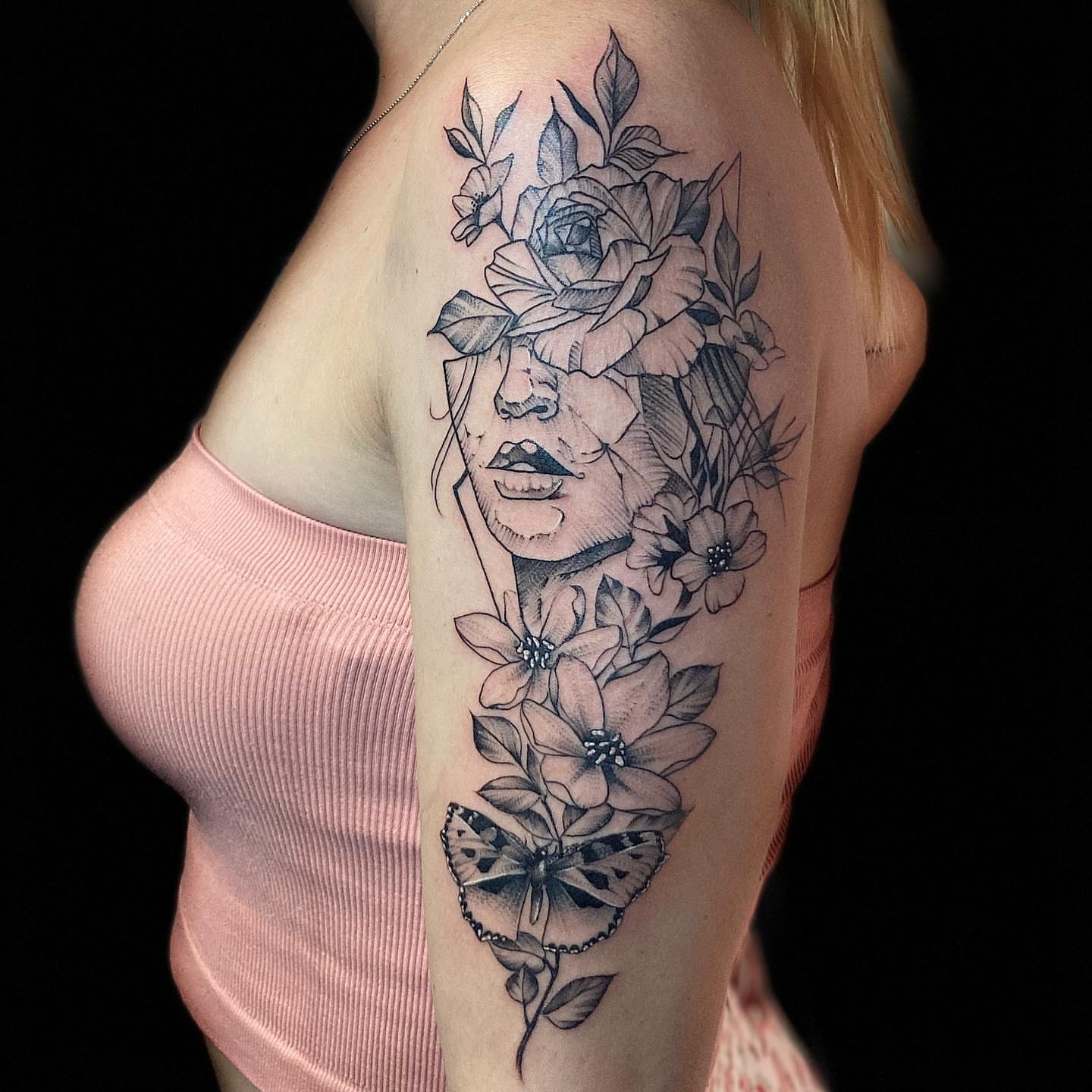 Floral portrait realism tattoo on the shoulder by Adrian Gonzalez