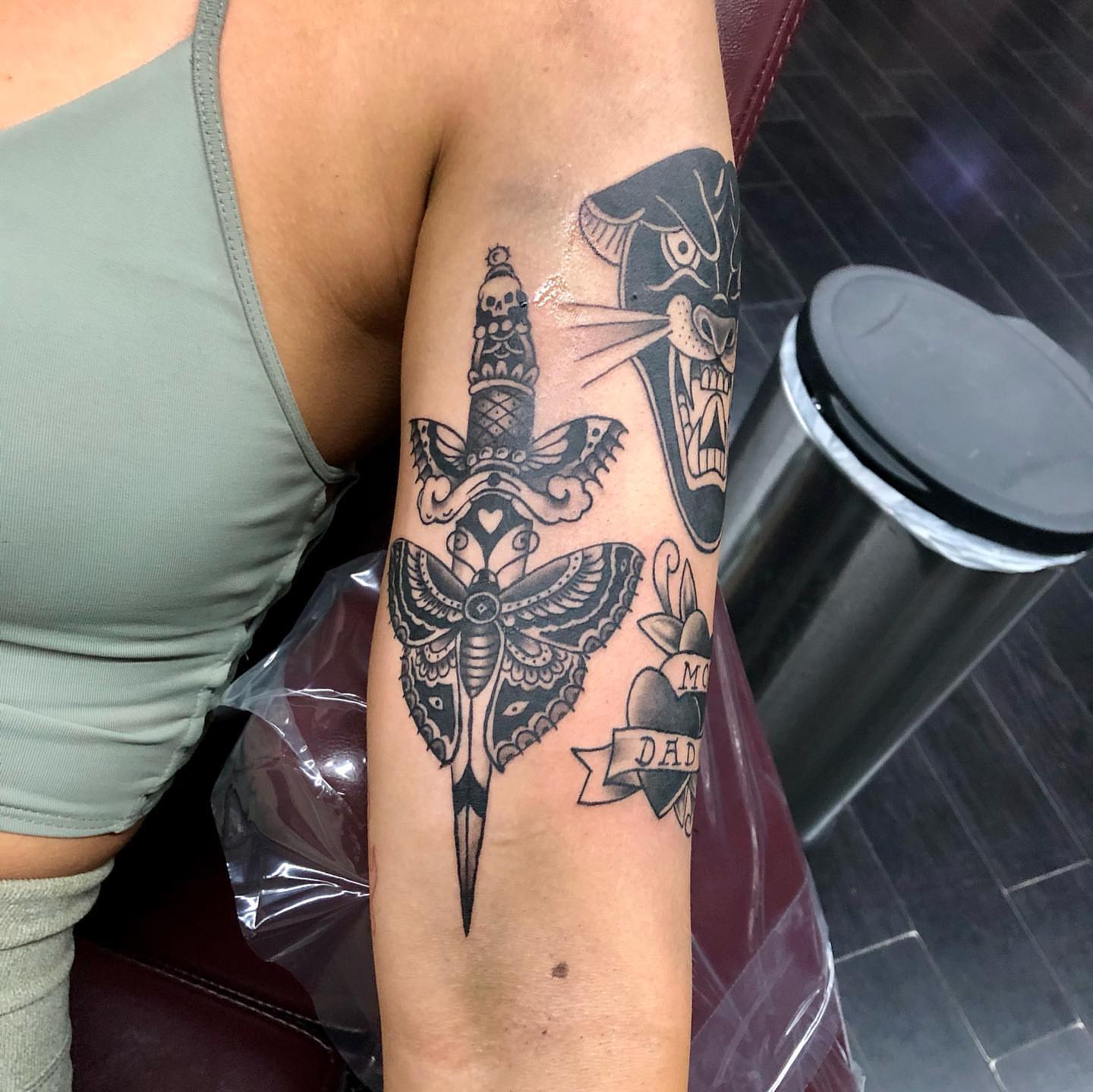 Knife and butterfly American traditional tattoo on the forearm by Tattoos by Rey G.