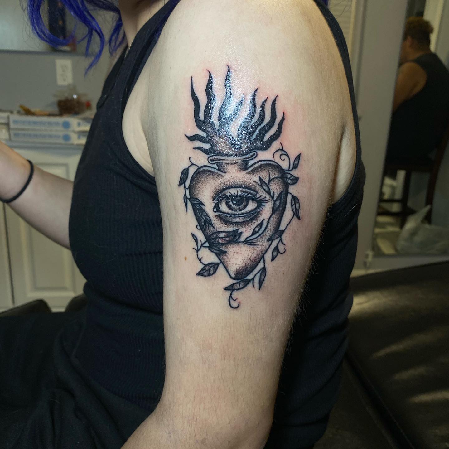 Eye with flames neo-traditional tattoo on the shoulder by Desirae✨