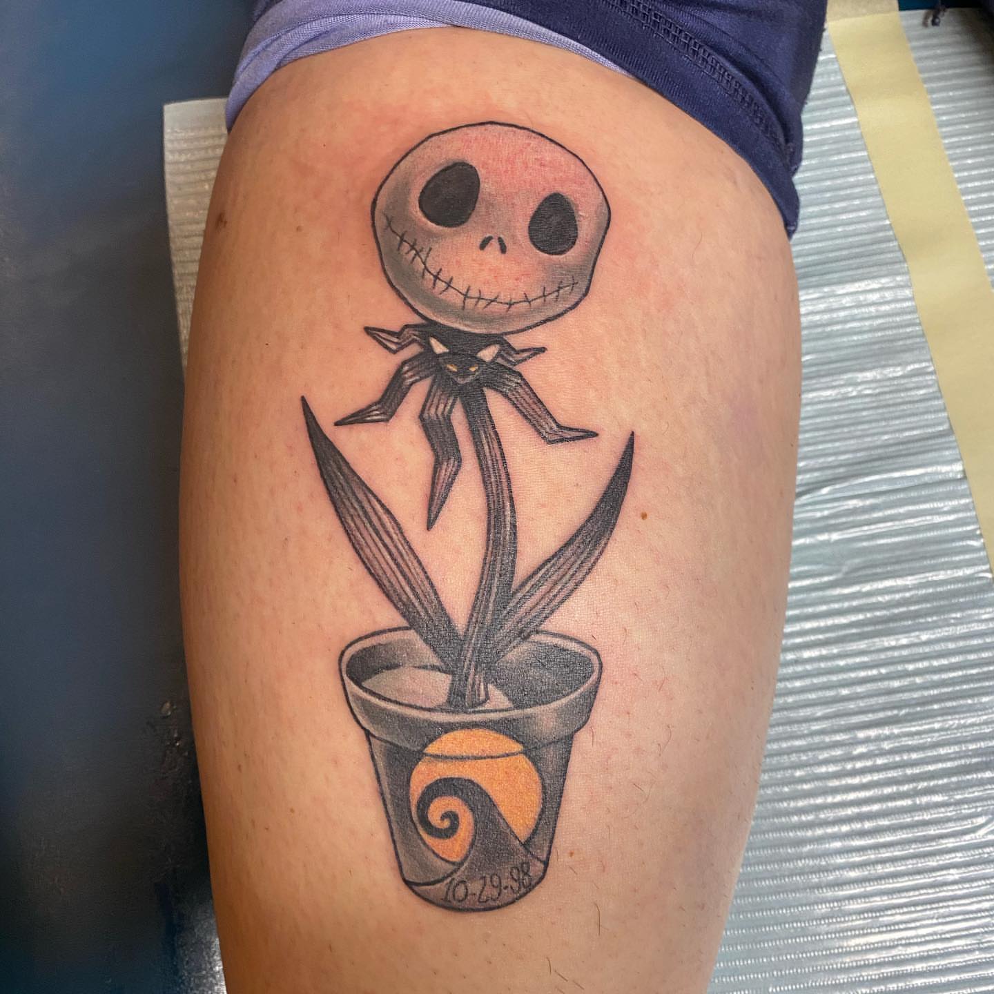 Jack Skellington black and grey tattoo on the thigh by Valen Laska