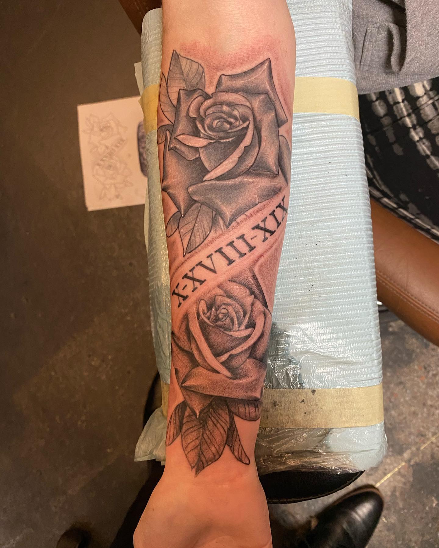 Roses realism tattoo on the forearm by Valen Laska
