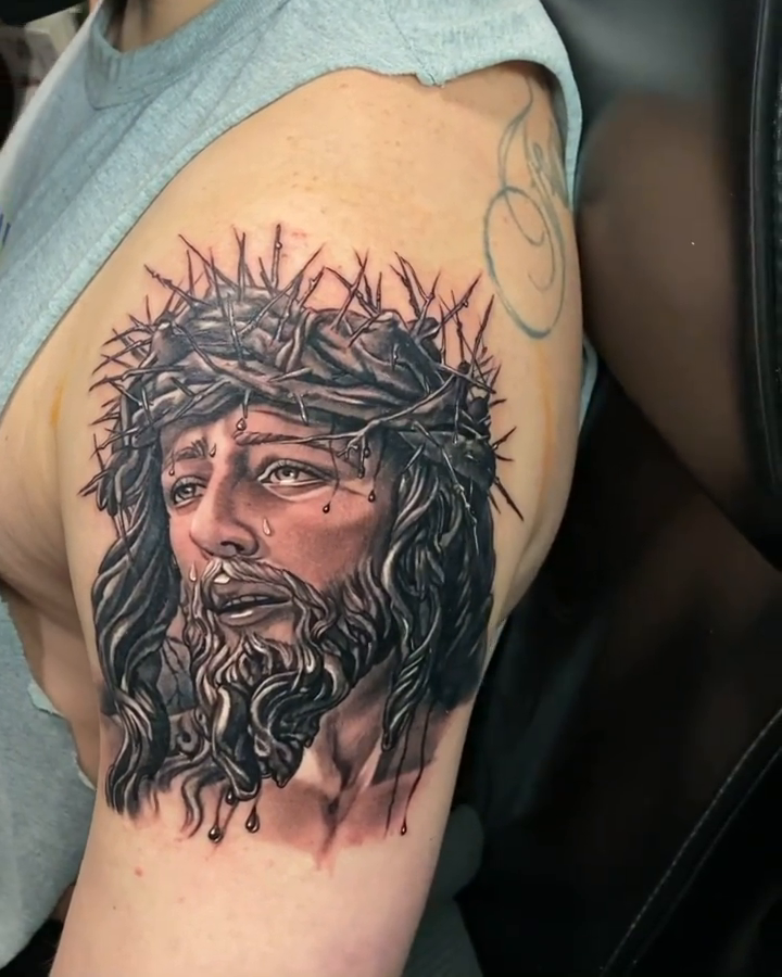 Jesus Christ with crown of thorns realism tattoo by Abel Deida