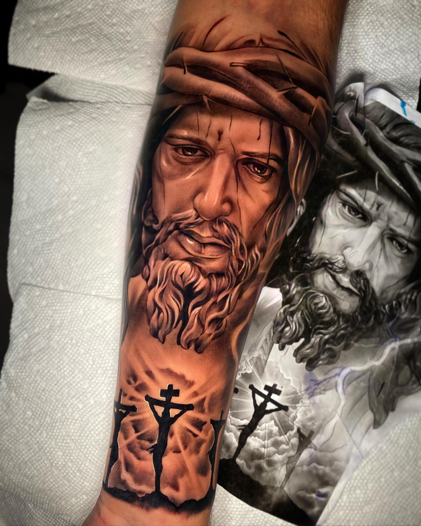 Religious figure realism tattoo on the forearm by Ivan Guadalupe guzman
