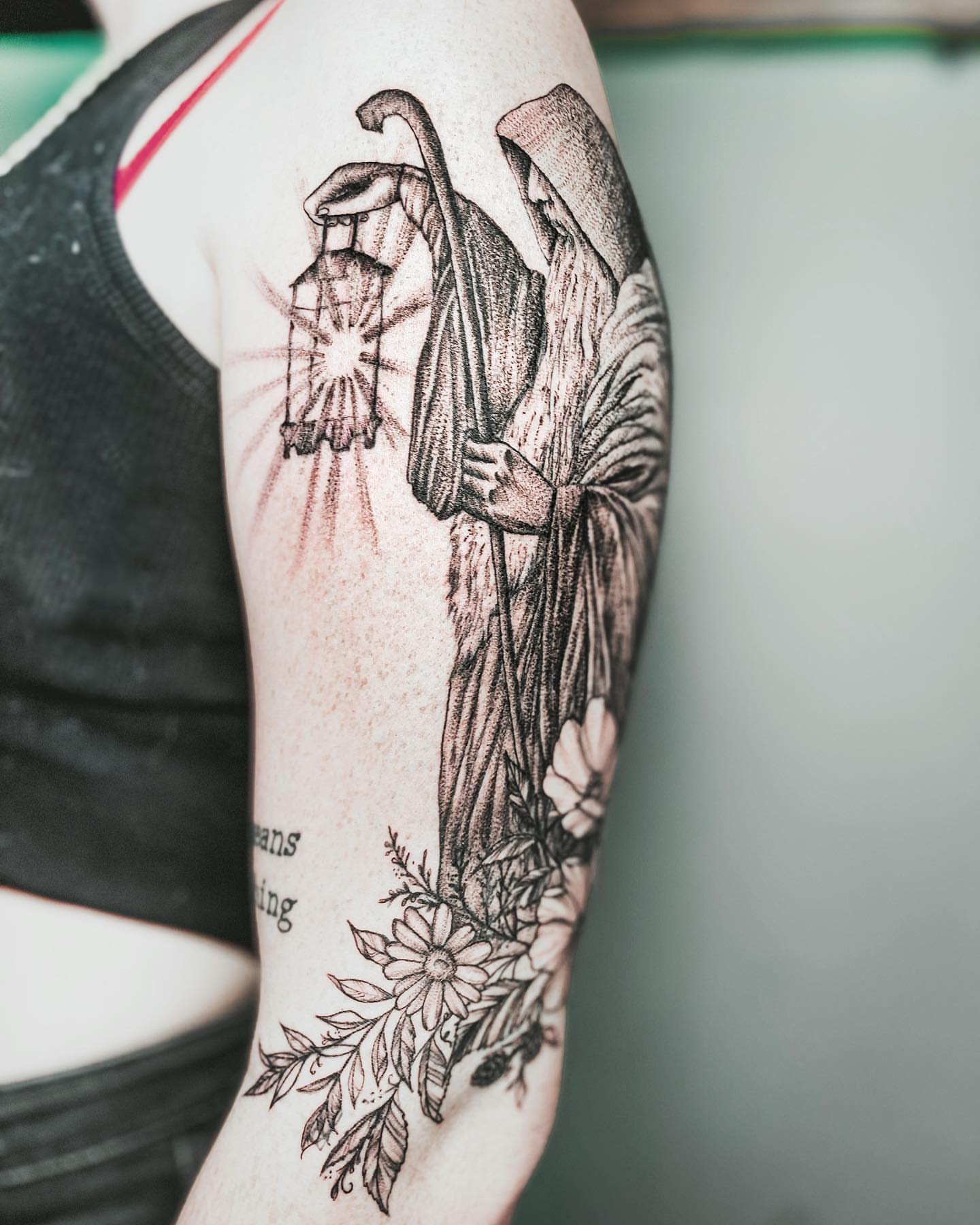 Grim reaper with lantern realism tattoo on the forearm by Ayauna Mai