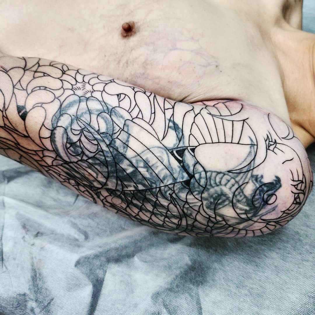 Koi fish black and grey tattoo on the forearm by CHUN (Chungyu Seong)