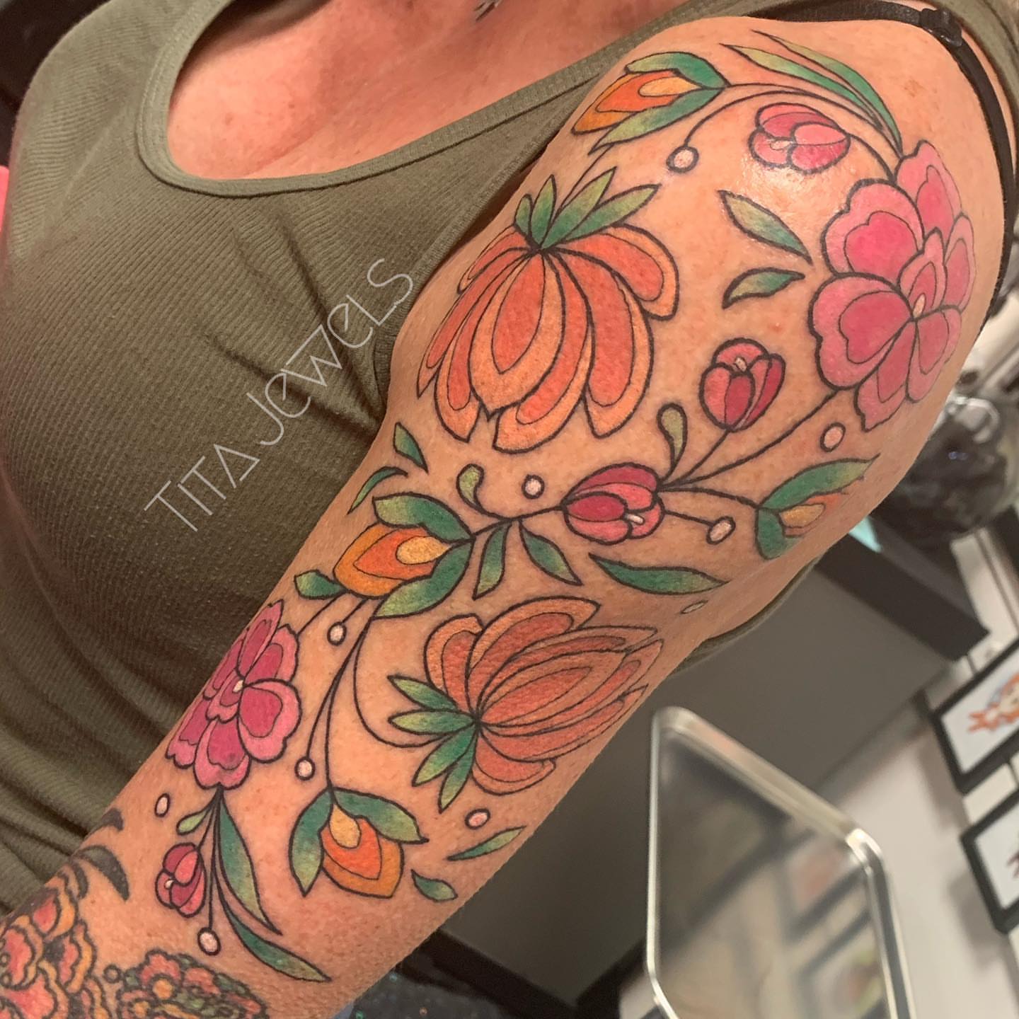 Floral design new school tattoo on the forearm by Tita Jewels- Tattoo Artist, Austin, Texas