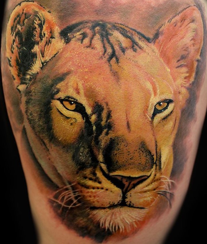 Lion realism tattoo on the forearm by Walter Frank