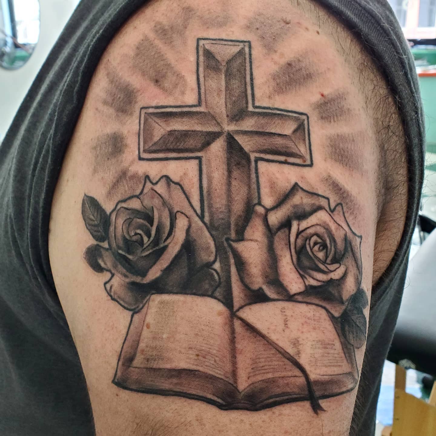 Cross and roses realism tattoo on the shoulder by David Nash, Evansville, Indiana
