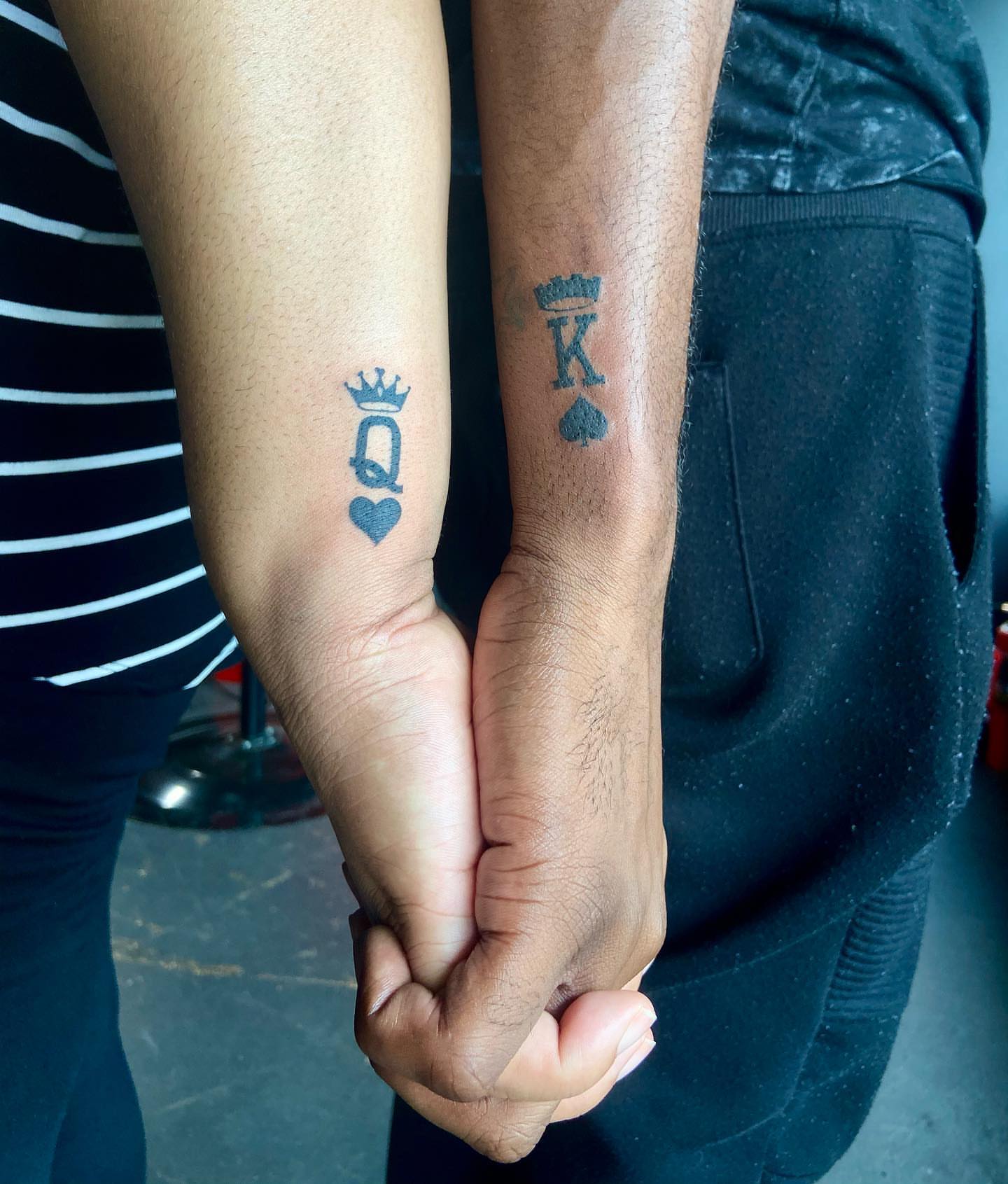 Royal symbols black and grey tattoo on the forearm by Tattoos by Tessa