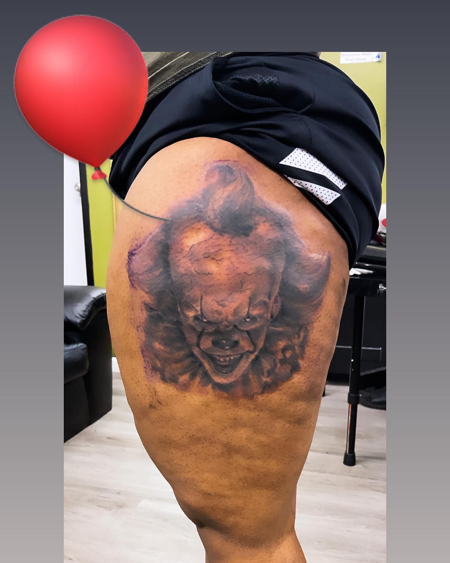 Clown realism tattoo on the thigh by Sly Davis