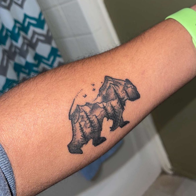 Bear black and grey tattoo on the forearm by Ink by Hailey π