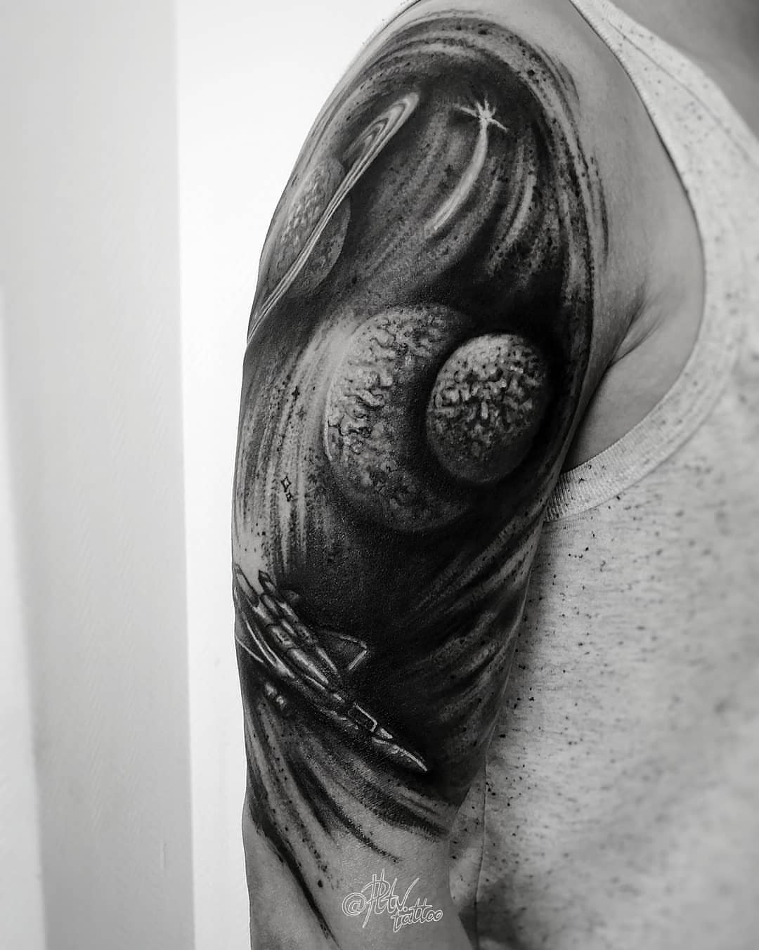Space scene realism tattoo on the shoulder by Dark Gothic Tattoo